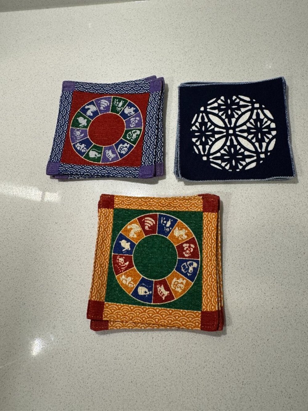 LOT OF 10 VINTAGE JAPAN FABRIC COASTERS ZODIAC DESIGNS BLUE